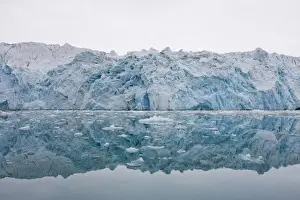 Krossfjorden Prints: Norway, Svalbard, Spitsbergen, Ice face of Lilliehook Glacier reflected in calm