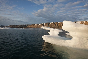 Images Dated 15th August 2009: Norway, Svalbard, Spitsbergen Island, Setting midnight lights melting iceberg