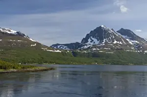 Images Dated 24th June 2009: Norway, Tromso. Gateway to the Arctic located above the Arctic Circle. Sailing into