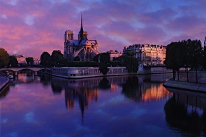 Notre Dame Prints: Notre Dame reflected on Seine River at sunrise, Paris, France