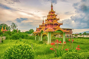 Images Dated 3rd June 2024: Nyaungshwe, Myanmar, Asia, Portrait of small Buddhist pagoda at sunset sitting in fenced field