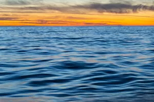 Greenland Gallery: Ocean waves at sunset, Greenland