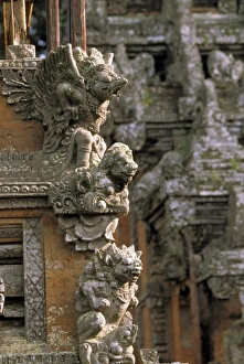 Figurine Prints: Oceania, Indonesia, Bali, Ubud. Stone carvings on Hindu temple in Monkey Forest