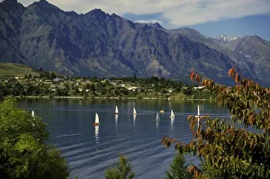 Peter Skinner Prints: Oceania, New Zealand, South Island, Queenstwon. Backdrop of lake and sailboats