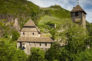 Northern Italy Prints: An old castle ruin in Northern Italy situated on a steep hillside