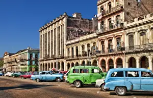 Images Dated 2027: Old Classic American cars in main central street by Capitol in Havana Habana Cuba