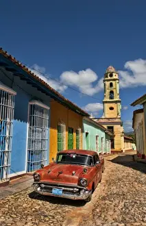 Cobble Stone Prints: Old Classsic Chevy on cobblestone street of Trinidad Cuba