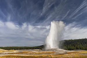 Geothermal Prints: Old Faithful geyser erupting, a cone geyser in the Upper Geyser Basin