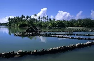 Old fashioned fish huts and canals in Tahiti in French Polynesia in the South Pacific Rim