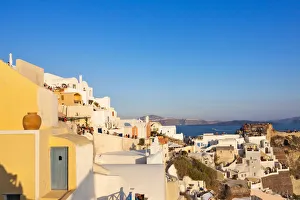 South Aegean Prints: Old fortress and houses on the coast of Aegean Sea. Oia, Santorini Island, Greece
