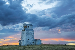 Granary Prints: Old granary with sunset clopuds near Choteau, Montana, USA