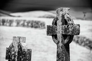Grave Prints: Old lichen-covered Celtic cross has been here for many years at Burrishoole Abbey in County Mayo