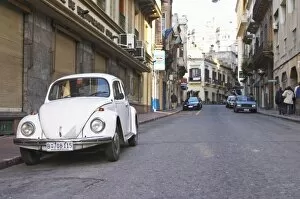 Images Dated 20th August 2005: An old white Volksvagen Beetle probably from the 1960s parked on the street in the