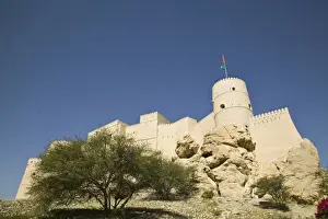 Oman, The Batinah Plain, Nakhal. Nakhal Fort at the foot of the Hajar Mountains / Exterior