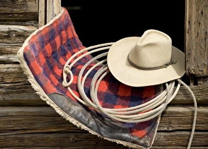 Blanket Prints: Oregon, Seneca, Ponderosa Ranch. Cowboy hat, rope and horse blanket sitting on