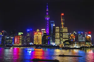 Shanghai Prints: Oriental Pearl TV Tower. Reflection of cityscape at night, Shanghai, China