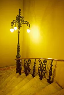 An ornate lamp splashes warm light onto this stairway, Rio de Janiero, Brazil