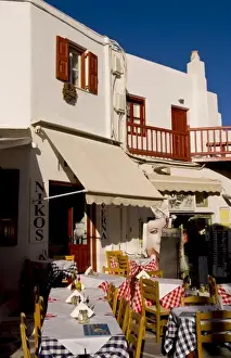Outdoor restaurant, Nikos, preparing for a meal, Mykonos