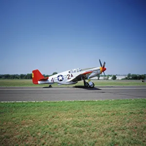 Tire Prints: P-51 C Tuskegee Red Tail airplane at the CAF Air Show in St. Paul, Minnesota