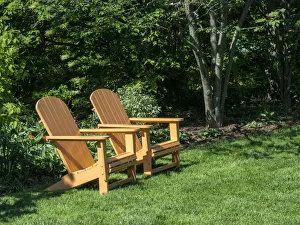 Pair of Adirondack chairs in a garden