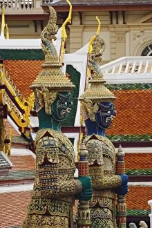 One of six pairs of guardian demons flanking entrance to the Gallery or Phra Rabiang