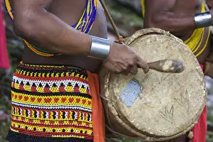 Images Dated 26th November 2008: Panama. A close up of a young Embra indian man playing the drums