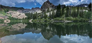 Panoramic landscape of Sundial Peak, Lake Blanche and reflection