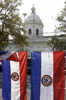 Images Dated 21st August 2007: Panteon de los Heroes and Paraguayan flags for sale. Asuncion is the capital of Paraguay