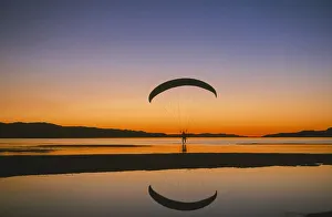 Skill Prints: Paraglider over the Great Salt Lake, Utah at sunset. (PR, MR)