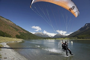 Images Dated 21st December 2007: Paramotor skimming water, Diamond Lake, Paradise, near Glenorchy, Queenstown Region