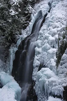 Skiing Prints: Partially frozen Fletcher Falls, British Columbia, Canada