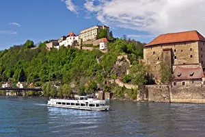 Republic Prints: Passau, Germany, a tourist boat sails down the Danube River in front of Veste Oberhaus castle