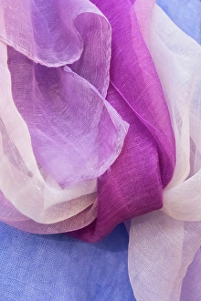 Fabric Prints: Pastel colored fabrics in hues of blue, pink, and purple