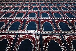 Pattern created by prayer rugs in Islamic mosque, Cairo, Egypt