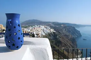 Vase Prints: Peak of mountain with vase overlooking Fira at beautiful Santorini Greece in Greek