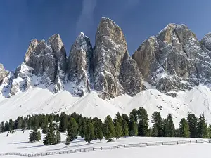 The peaks of the Geisler mountain range in valley Villnoess after a snow strom in spring