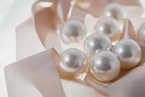 Images Dated 8th November 2022: Pearls and ribbons