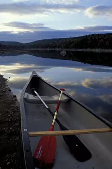 Pemadumcook Lake, ME. Northern Forest. Canoeing. A canoe rests on the shore