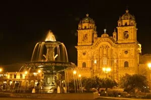 Peru, Cusco, Night view of fountain and Cathedral of Cusco, Plaza de Armas