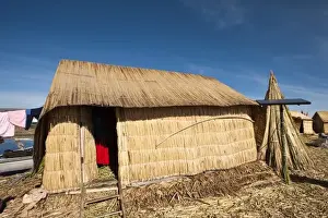 Uros Islands Prints: Peru, Lake Titicaca. Quechua or Uros Indian village on the floating Uros Islands
