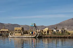 Images Dated 14th October 2009: Peru, Lake Titicaca. Quechua or Uros Indian village on the floating Uros Islands