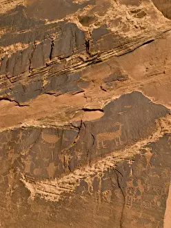Images Dated 9th October 2008: Petroglyphs -- Native American rock art on cliffs along Colorado River near Moab, UT