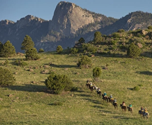 Philmont Cavalcades ride horses through the rugged mountain wilderness like the famous