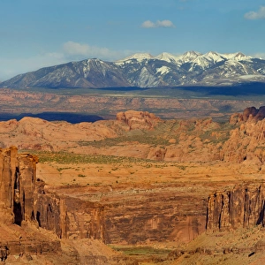 Snowy Prints: Photo taken from Long Canyon with badlands and snow capped La Sal Mountains in distance