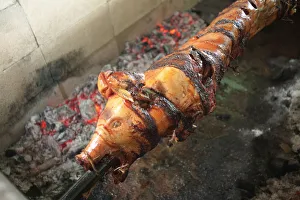 Images Dated 16th August 2006: Pig Roast over pit barbeque, Old San Juan