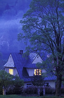 Poland, Carpathian Mountains, Zakopane. View of chalet and Tatra Mountains