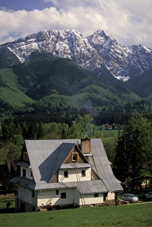 Chalet Prints: Poland, Carpathian Mountains, Zakopane. View of chalet and Tatra Mountains