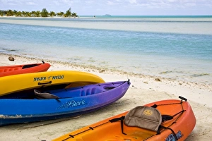 Aitutaki Prints: Polynesia, Cook Islands, Aitutaki. Colorful kayaks on the beach