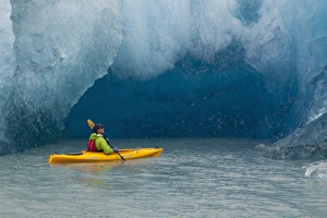 Images Dated 27th June 2011: Port Nellie Juan, Prince William Sound, Alaska, a kayaker pauses to look at a magnificent