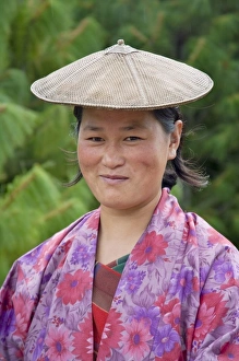Bumthang Prints: Portrait of a farmer wearing bamboo hat, Bumthang, Bhutan. (MR)